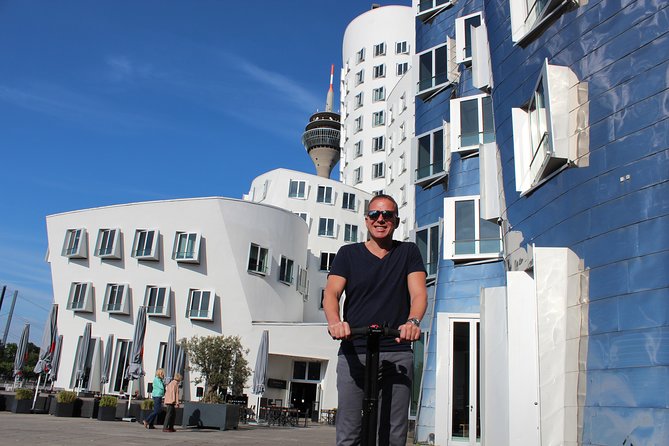 Düsseldorf Segway Rhein Tour: Rhine River Experience - Crossing to Oberkassel by bridge