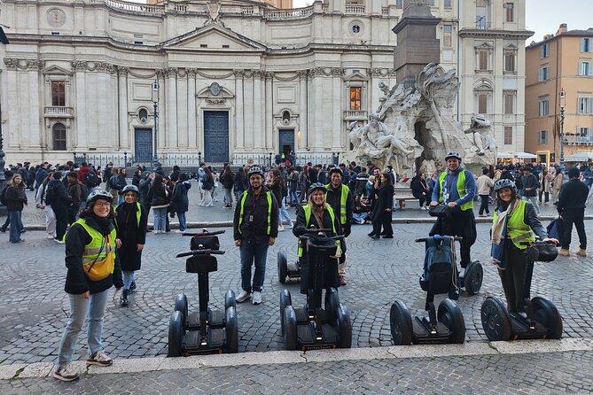 Rome at Night Segway Small Group Tour - Trevi Fountain under evening lights