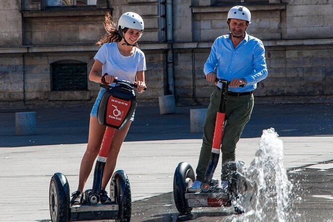 Segway Tour by ComhiC - Presqu'île - 1h - Place Bellecour and the view across the Saône